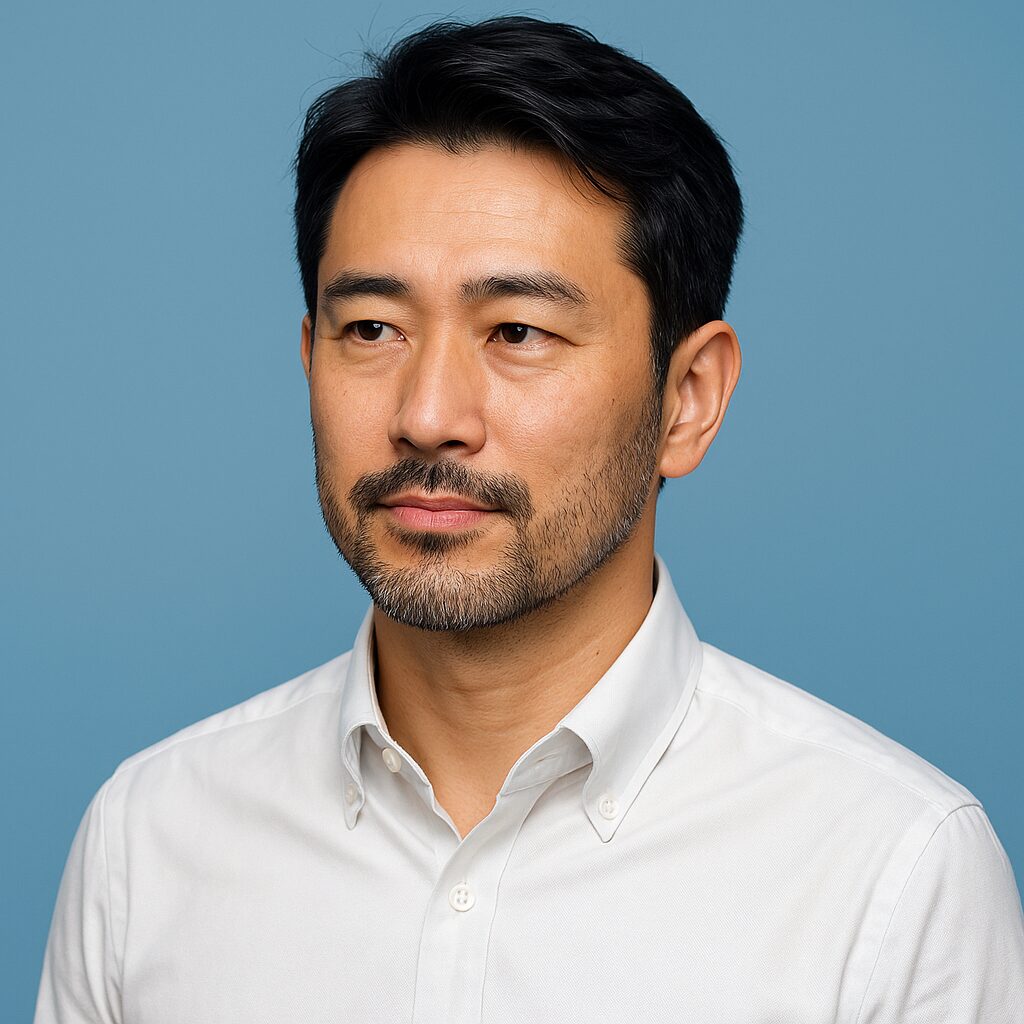 青い背景で清潔感のある40〜50代日本人男性の半リアルポートレート（婚活向け髭スタイルイメージ）